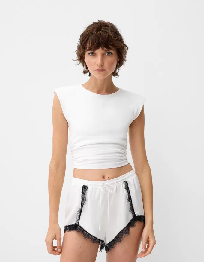 Shorts de encaje satinado Off white