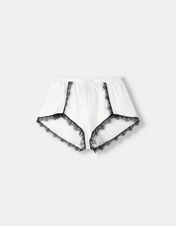 Shorts de encaje satinado Off white