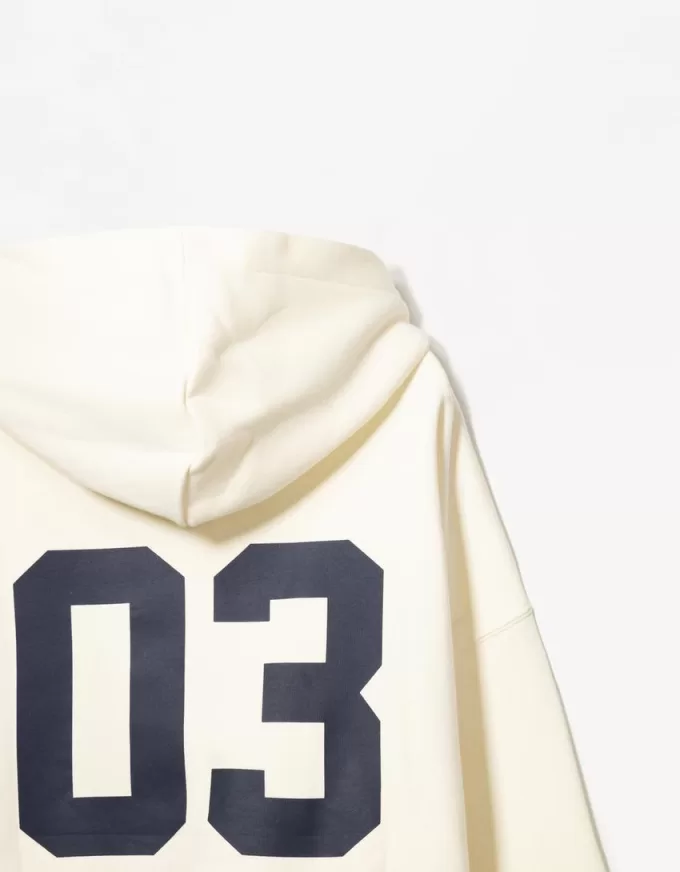 Sudadera con capucha estampada y cremallera Mustard