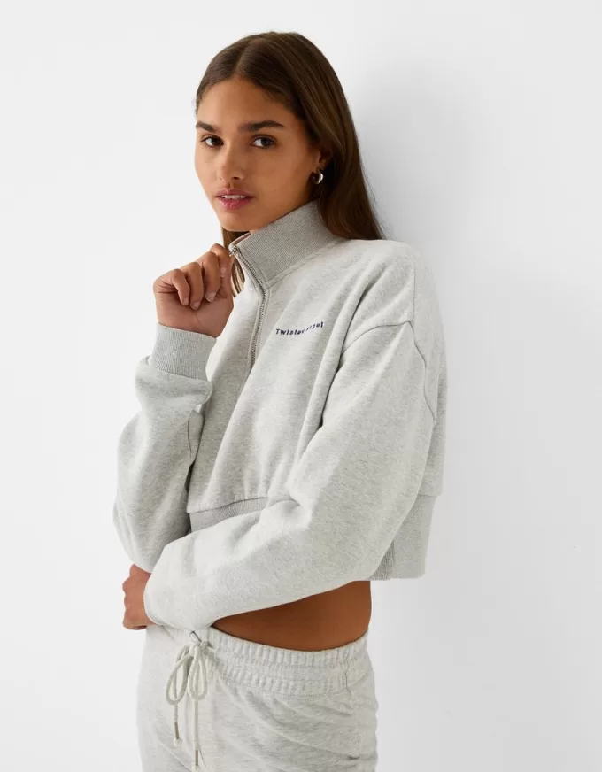 Sudadera con cremallera y bordado Grey