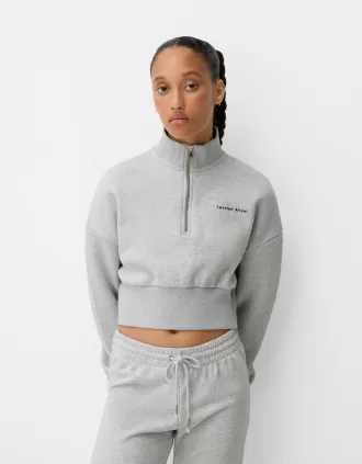 Sudadera con cremallera y bordado Grey