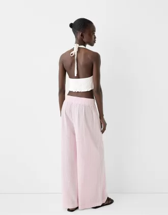 Top corto con cuello halter en mezcla de lino Off white