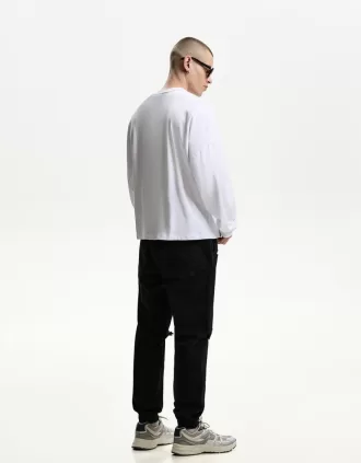 Vaqueros jogger rotos Black