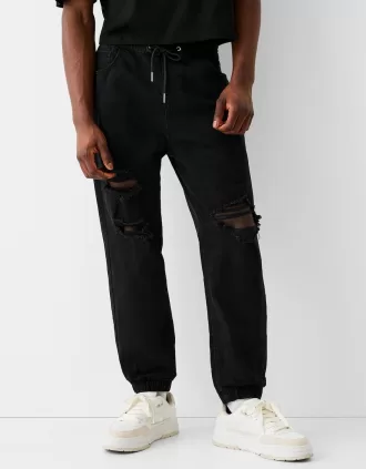 Vaqueros jogger rotos Black