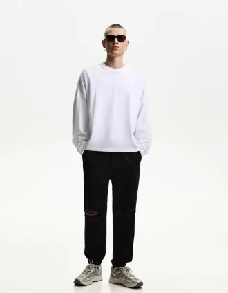 Vaqueros jogger rotos Black