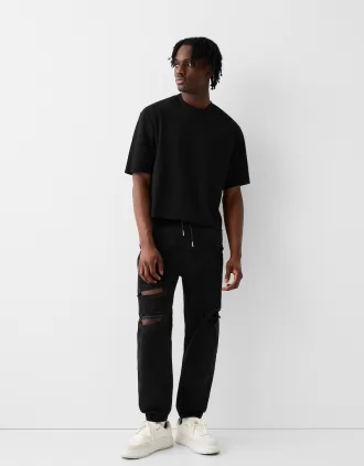 Vaqueros jogger rotos Black
