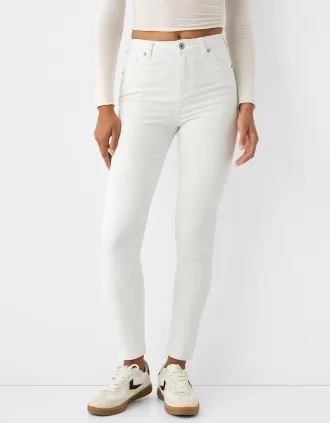 Vaqueros pitillo de talle muy alto White
