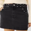 minifalda con tachuelas Black