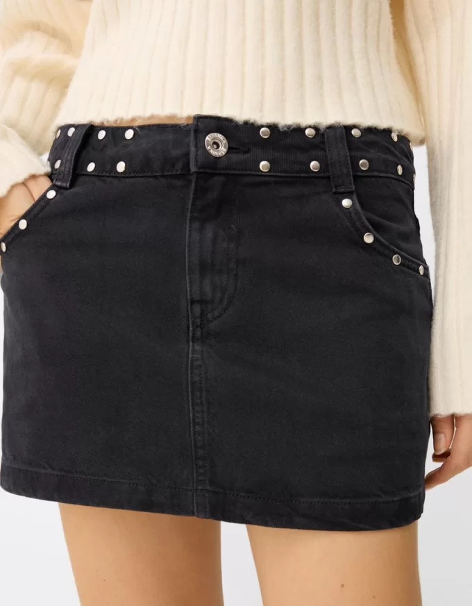 minifalda con tachuelas Black