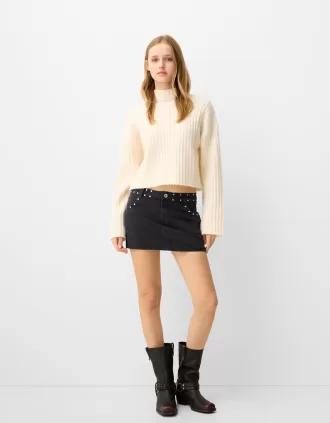 minifalda con tachuelas Black